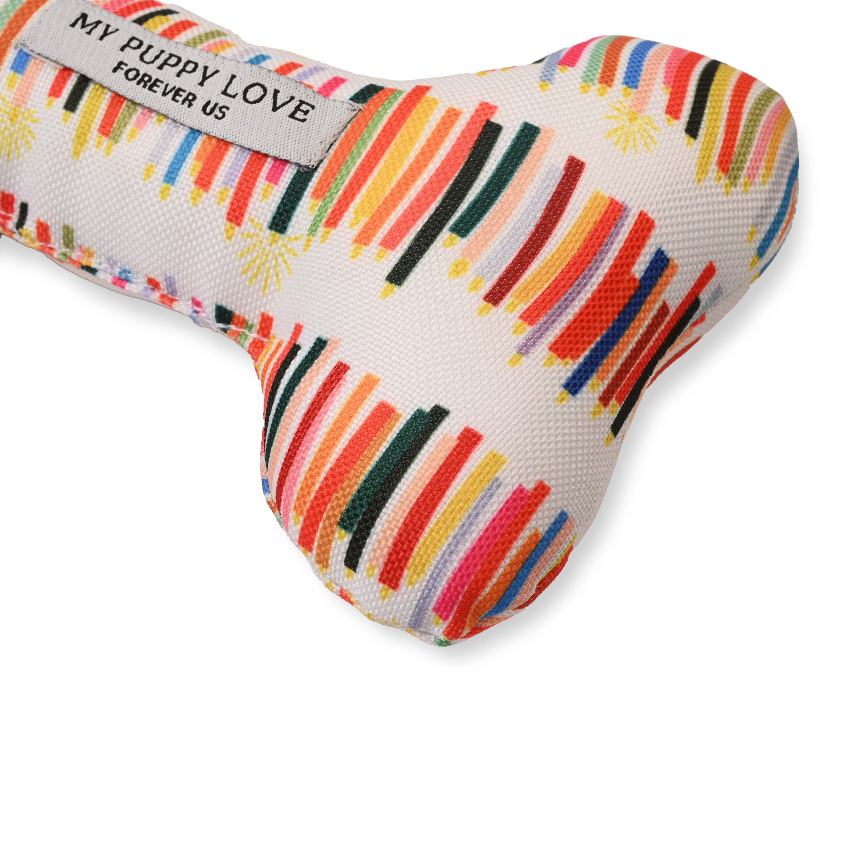 Candle Tails Cuddle Bone Toy